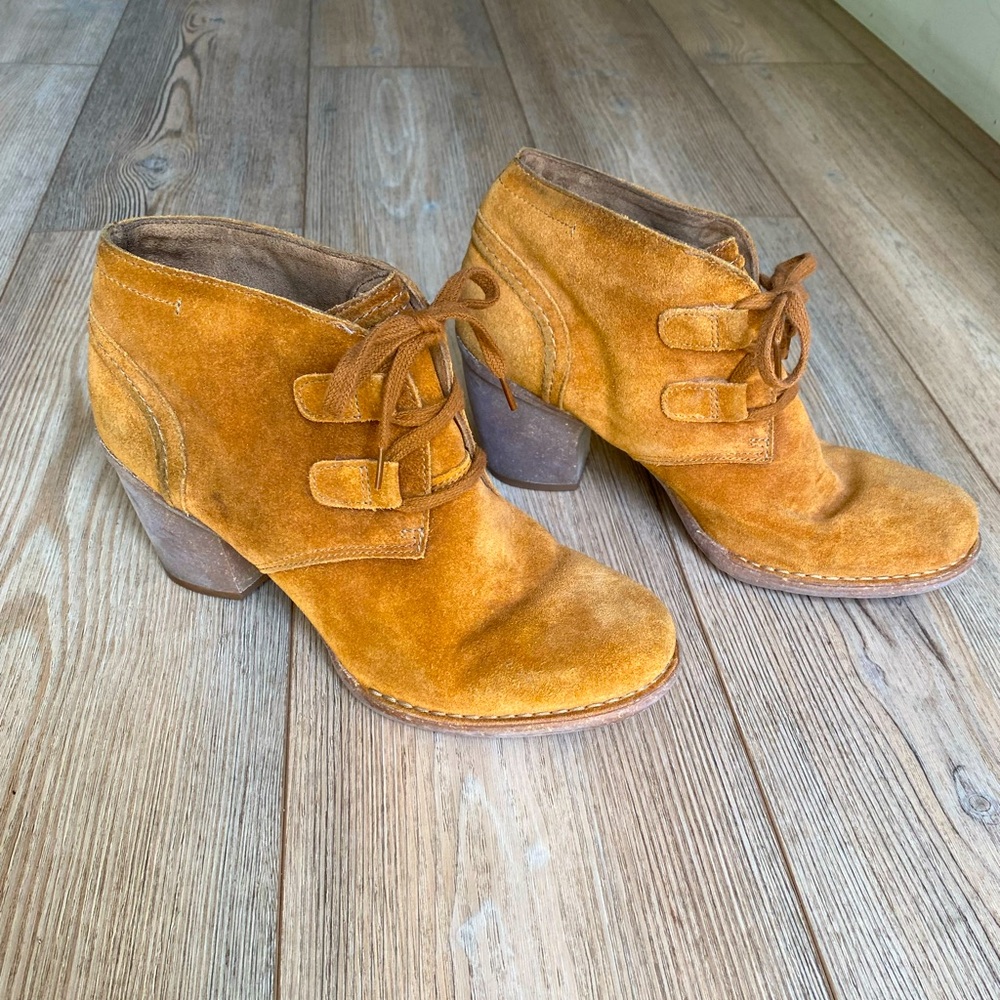 Medium tan suede Clark heeled ankle boots